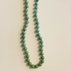 Genuine JADE necklace with matching earrings. Sterling silver clasp